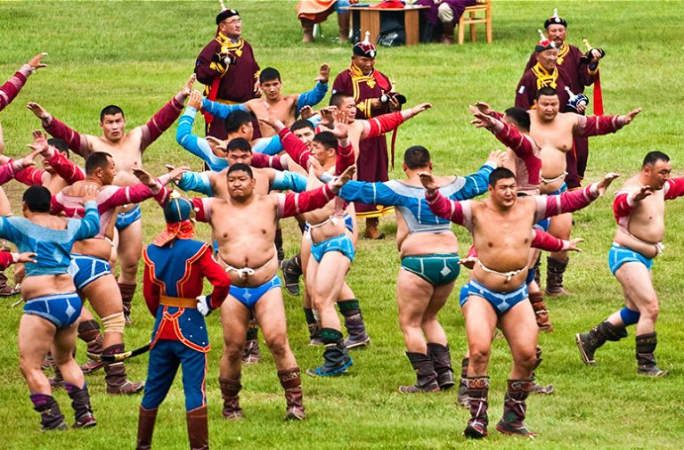 Mongolian wrestlers doing their famous 'eagle dance' prior to competing at the Mongolian wrestling competition