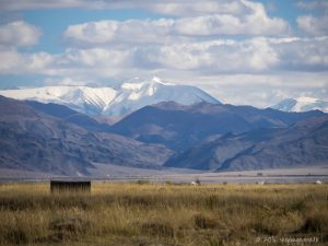 Panoramic view of the snow capped Altai Mountains in western Mongolia