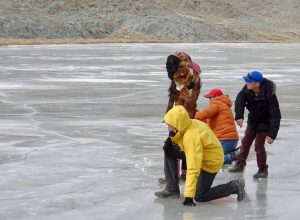 An impromptu EL international ice shagai competition. Khovd River, Ulaankhuus., Bayan Ulgii Province, Western Mongolia. One Australian, two Mongolians and a Kazakh eagle hunter. * Shagai is the traditional Mongolian game of ankle bone shooting. Don’t dismiss it. It is far more interesting than the name leads you to believe and makes a great spectator sport. This photo was taken by our guest Viv McWaters this March on one of our Mongolia winter tours.