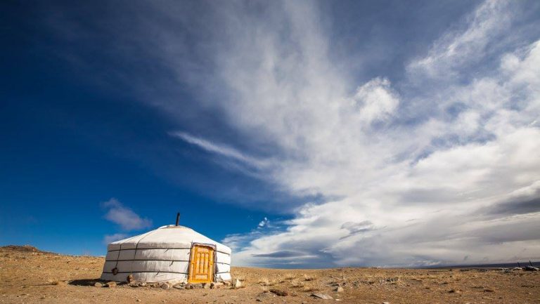 A Mongolian ger surrounded by the immensity of Mongolia's middle Gobi landscapes