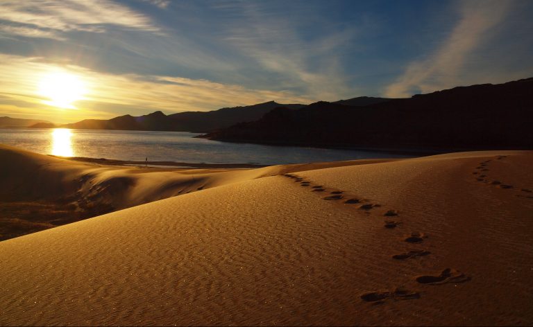A glorious image of Khar Nuur in Zavkhan Province - it is quite remarkable - a crystal clear alpine lake surrounded by mountain steppe and sand dunes.