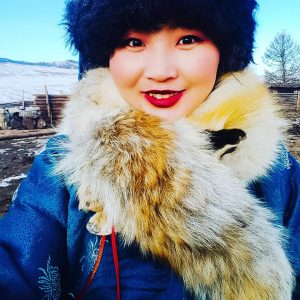 Say hello to Bayaraa! One of my female Mongolian trip assistants during Tsagaan Sar - Mongolian Lunar New Year. Most Mongolians will buy a a new del (traditional Mongolian coat) for their Lunar New Year.