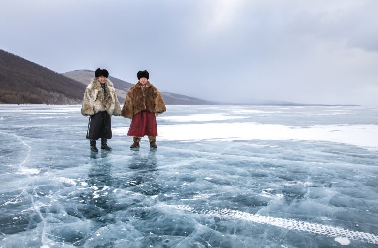 The Khoridol Saridag Mountains and western shoreline provide a backdrop to the frozen lake surfaces of Khovsgol Nuur. Notice the traditional and WARM (!) coats modelled by Turuu and Bataa. These are hand made for Eternal Landscapes.