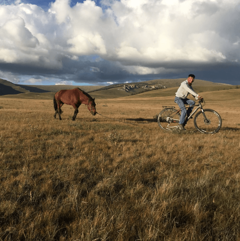 Combining mountain biking with horse trekking in Mongolia