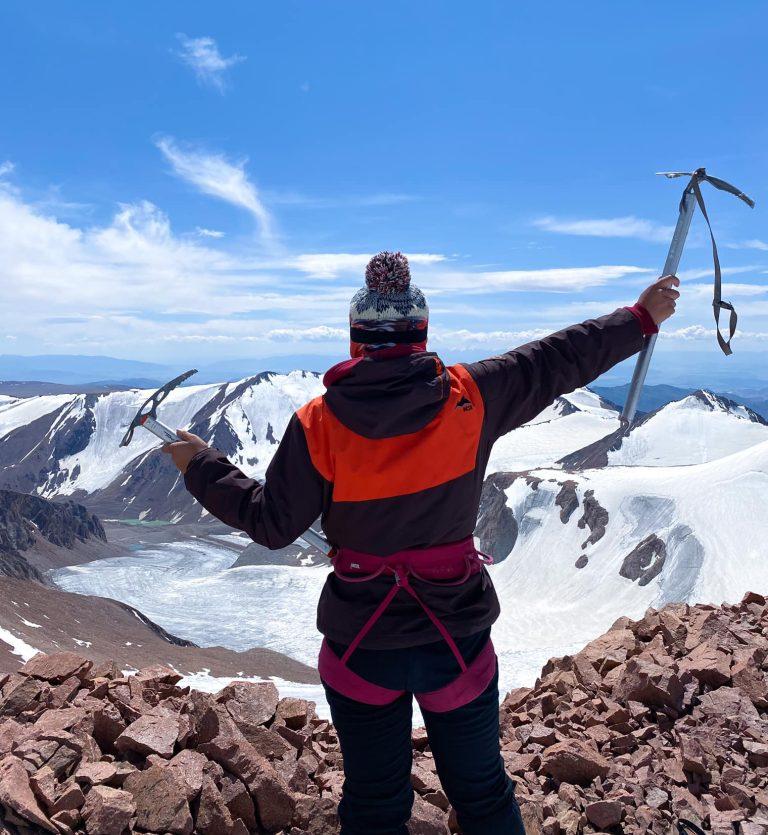 Pujee - a Eternal Landscapes trip assistant - woman achieving new heights on top of Kharkhiraa Mountain .