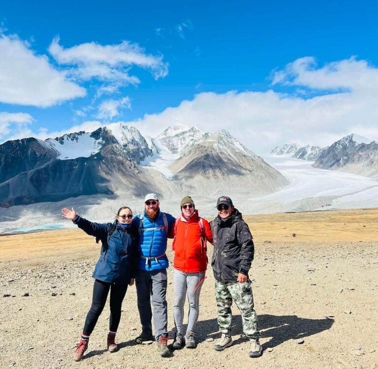 A group at Altai Tavan Bodg on Homestay guests on Eternal Landscapes Mongolia trip